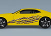 barbwire flames decals on the side of yellow mustang 
